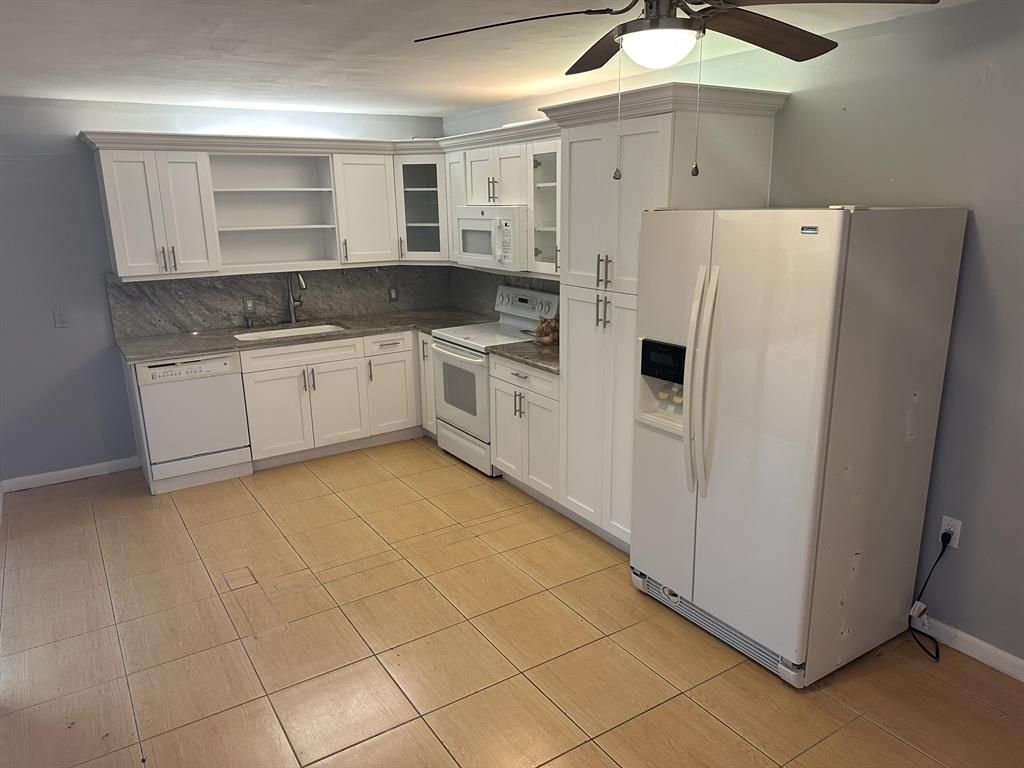 Photo of 417 4th Lane, Palm Beach Gardens, FL 33418 (MLS # R10863524)