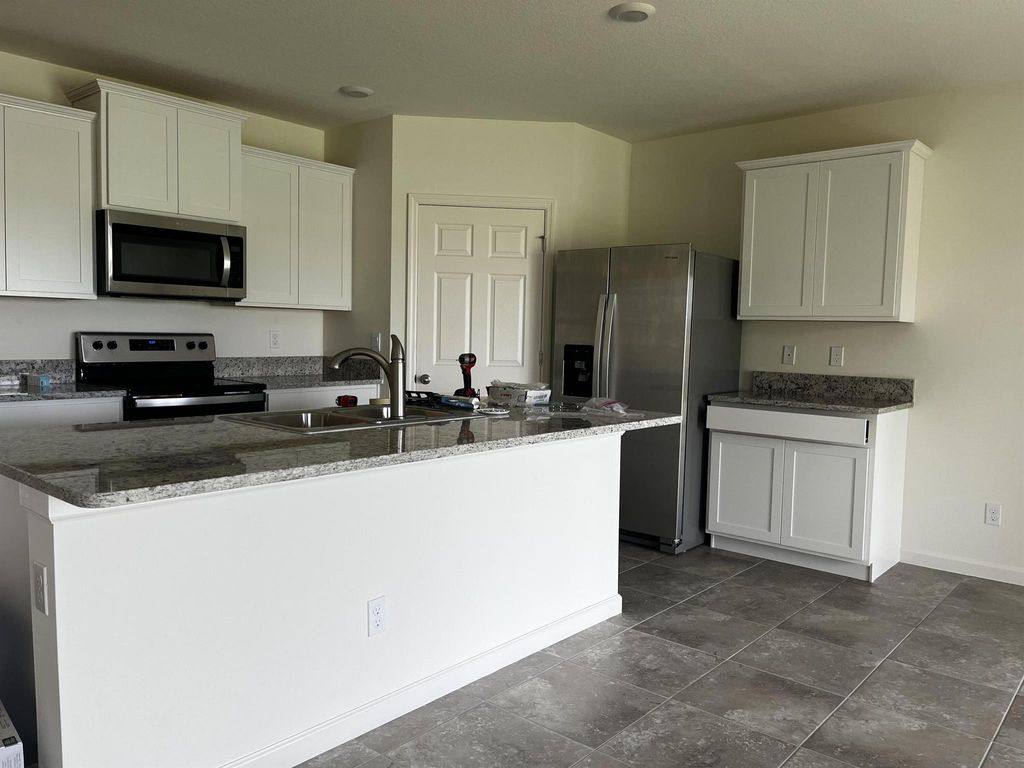 Photo of 12263 Arabella Drive, Port Saint Lucie, FL 34987 (MLS # R10998495)