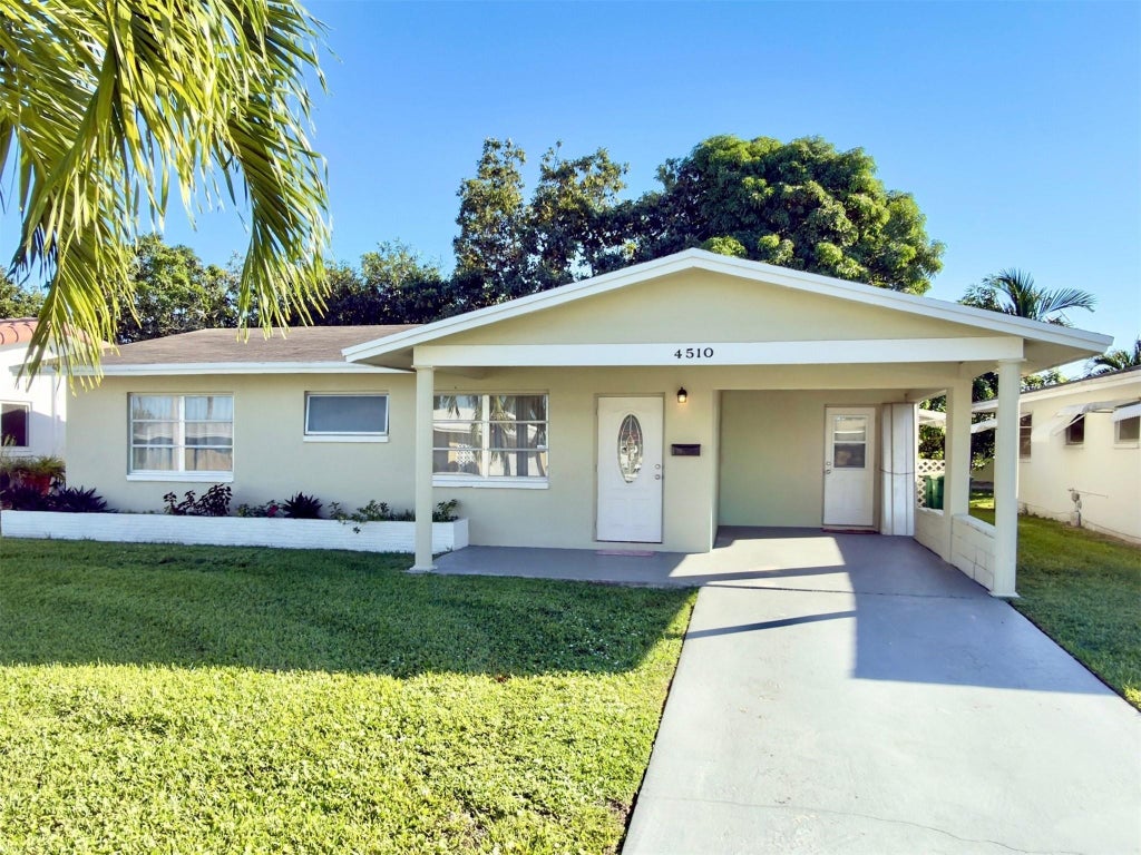 Photo of 4510 NW 46th Street, Tamarac, FL 33319 (MLS # B26035874)