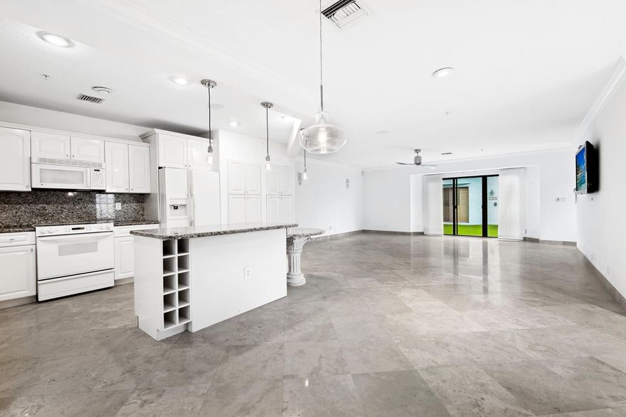 Beautiful 3 bedroom townhome just one block to the beach in sunny Pompano Beach! This beautiful three-level residence offers 3 spacious bedrooms and 3.5 bathrooms, perfect for your lifestyle. Featuring a private elevator and an attached 2-car garage, convenience is at your doorstep. The expansive second-floor main living area showcases a gourmet kitchen with granite countertops and an oversized island—perfect for entertaining. Enjoy peaceful moments on the first-floor patio, unwind with a book on the main level outdoor patio, or sip your morning coffee on the primary suite's private balcony. Just steps from the beach and intracoastal, and with easy access to local dining and transit options like the Water Taxi, this home is a true gem! NEW appliances to be installed prior to move in.