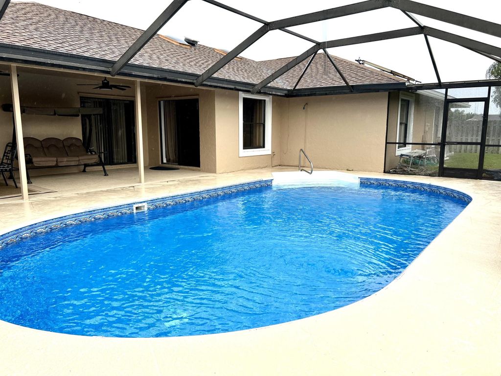 Photo of 1873 Hollyhock Road, Wellington, FL 33414 (MLS # R10938044)