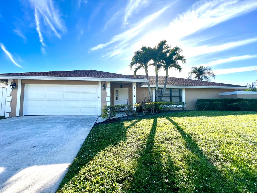 Photo of 1873 Hollyhock Road, Wellington, FL 33414 (MLS # R10938044)