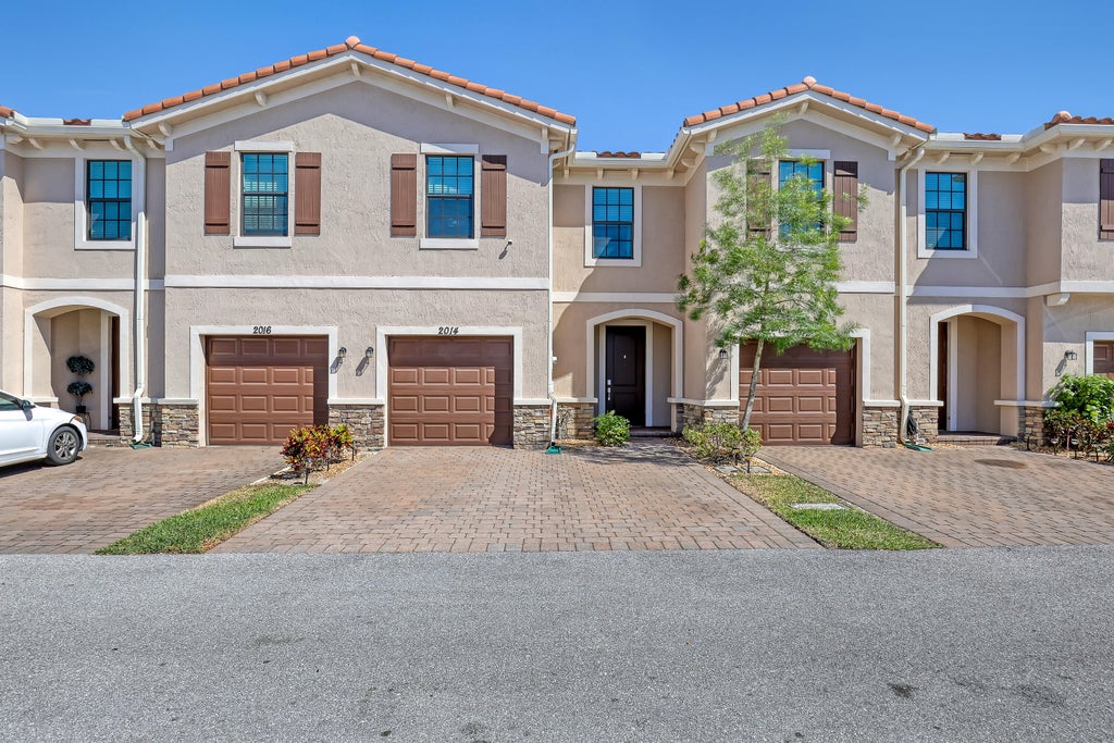 Photo of 2014 Hawksbill Pl, Riviera Beach, FL 33410 (MLS # R11069129)