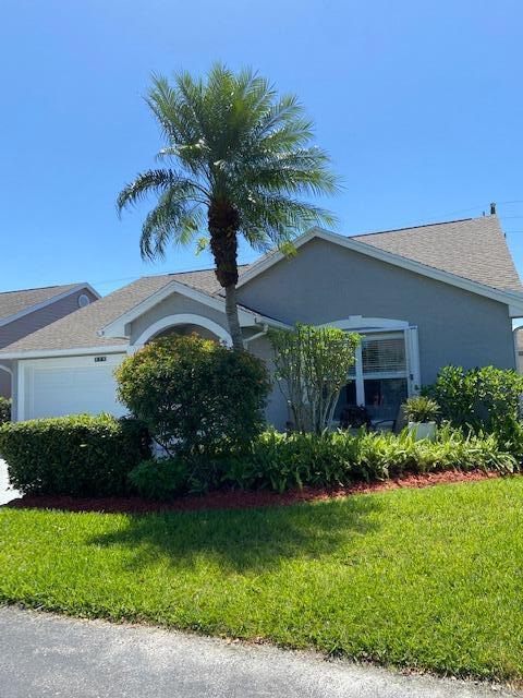 **HOUSE WILL COME BACK ON THE MARKET IN MID-JULY.* NEW ROOF-2024! New elec. panel 5/2025. Plumbing has been re-piped through attic. Upon entering this home, you will be amazed at the large living/dining areas. Pass-through window w/wine rack has been created from kitchen to dining area for serving convenience. Kitchen also opens up to family room. Lanai is enclosed and has glass windows. Privacy hedge out back & no neighbors behind. Extra glass front door with screen to enjoy breezy days. Exterior storage room 10 x 5. Lots of additional parking for you & your guests. PLUS you have your own 2-car garage. Separate laundry rm. Accordion shutters. One-time capital contribution at closing $1,135. Kings Isle is a 55+ community w/endless clubs and activities such as pickleball, tennis,