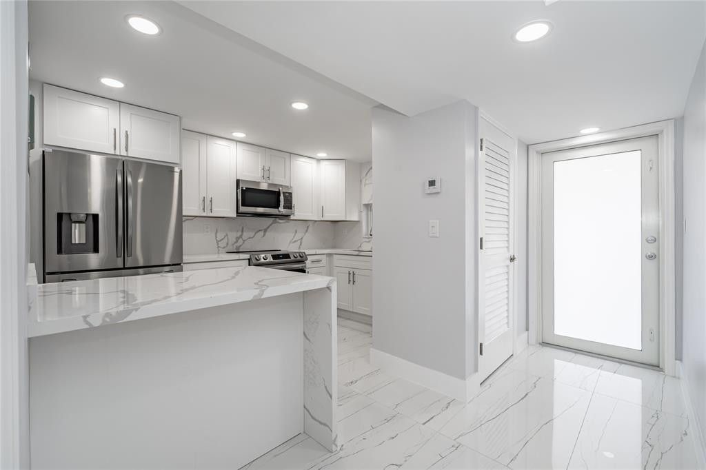 Photo of 361 S Hollybrook Drive #105, Pembroke Pines, FL 33025 (MLS # F10512735)