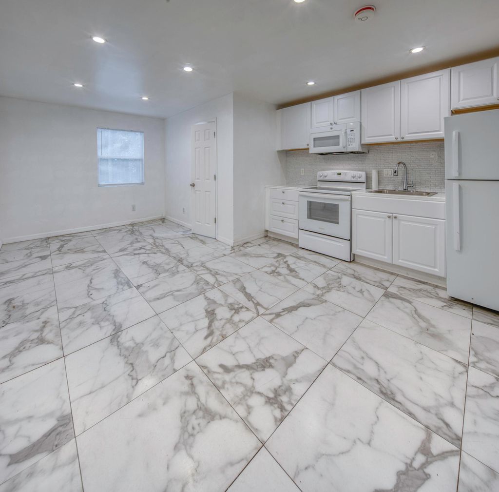 Photo of 519 S M Street #2 (rear), Lake Worth Beach, FL 33460 (MLS # B26032063)