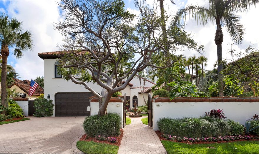 Steps from the beach, near Atlantic Avenue, this Tuscan-inspired seaside villa reveals its irresistible charms right inside its exquisite walled garden courtyard with tranquil fountain. Lofty skylit ceilings, Mexican tile floors, an inviting fireplace, and impact-glass are featured in the bright living areas. The loggia is wrapped by the sparkling pool in the backyard oasis. A private guest house is above the garage.