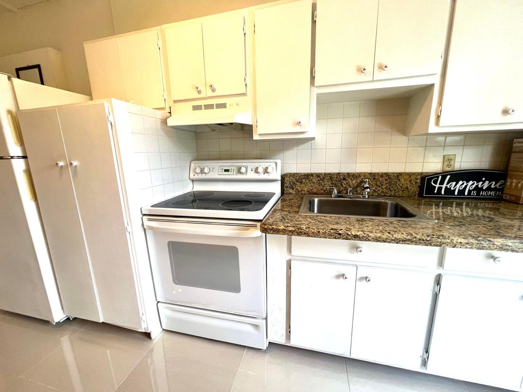 Photo of 101 Mallard Court, Royal Palm Beach, FL 33411 (MLS # R11081126)