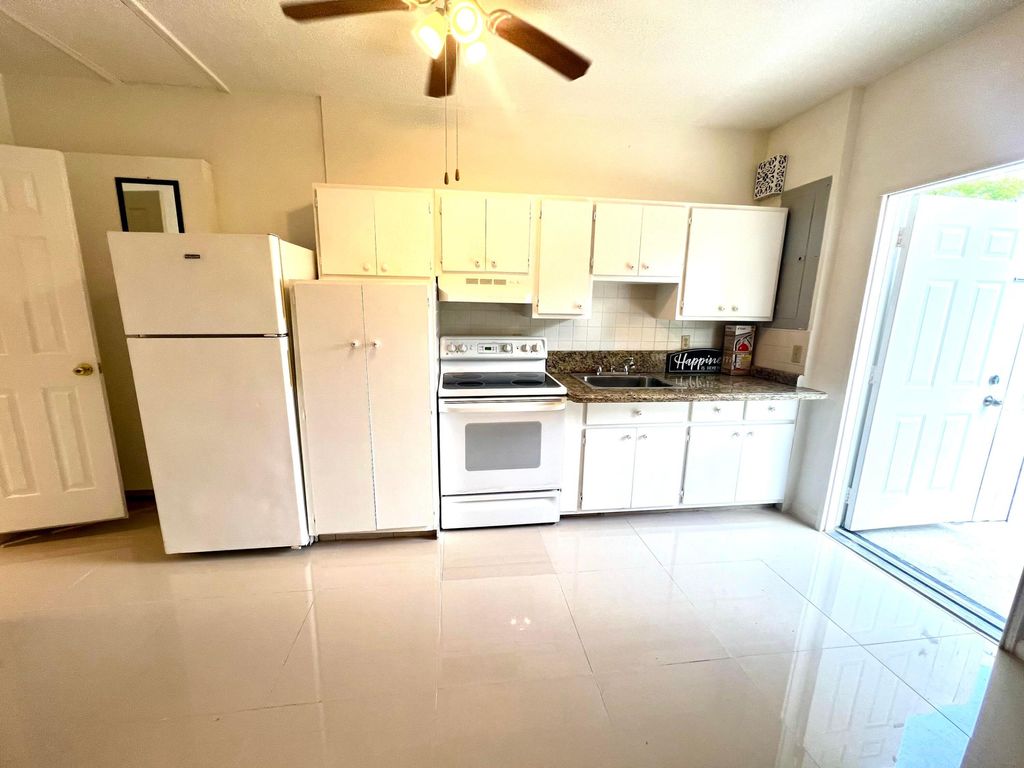 Photo of 101 Mallard Court, Royal Palm Beach, FL 33411 (MLS # R11081126)