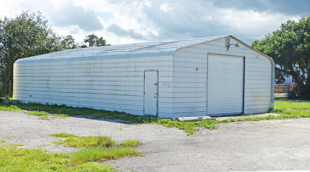 Photo of 15689 ORANGE Avenue, Fort Pierce, FL 34945 (MLS # B26075181)