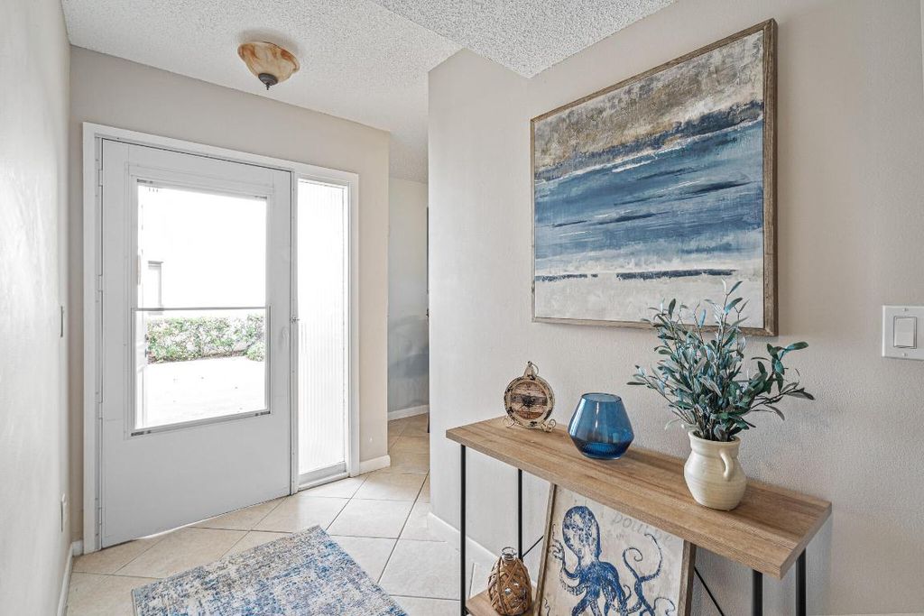 Photo of 30 Pelican Pointe Drive #102, Delray Beach, FL 33483 (MLS # R10960387)