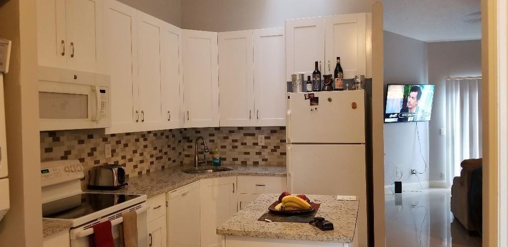 Photo of 740 NW 47th Street, Deerfield Beach, FL 33064 (MLS # F10515521)