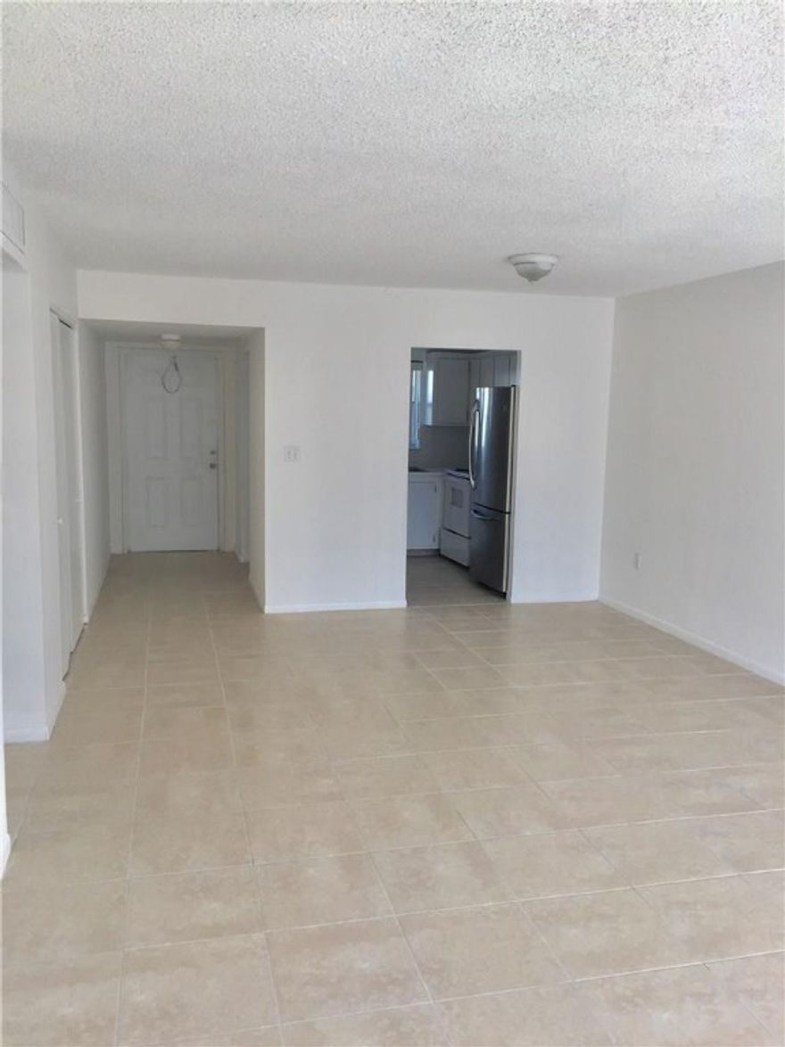 TILE THROUGHOUT IN THIS PENTHOUSE FLOOR, 2 BEDROOM/2 BATHROOM UNIT. ENJOY LIVING IN THIS SPACIOUS UNIT THAT HAS BEEN FRESHLY PAINTED, NEW TILE INSTALLED, HAS NO CARPET, AND PLENTY OF STORAGE. PALM ISLES IS A GATED COMMUNITY CONVENIENTLY LOCATED JUST EAST OF 95. PRICED TO RENT, EASY TO SHOW