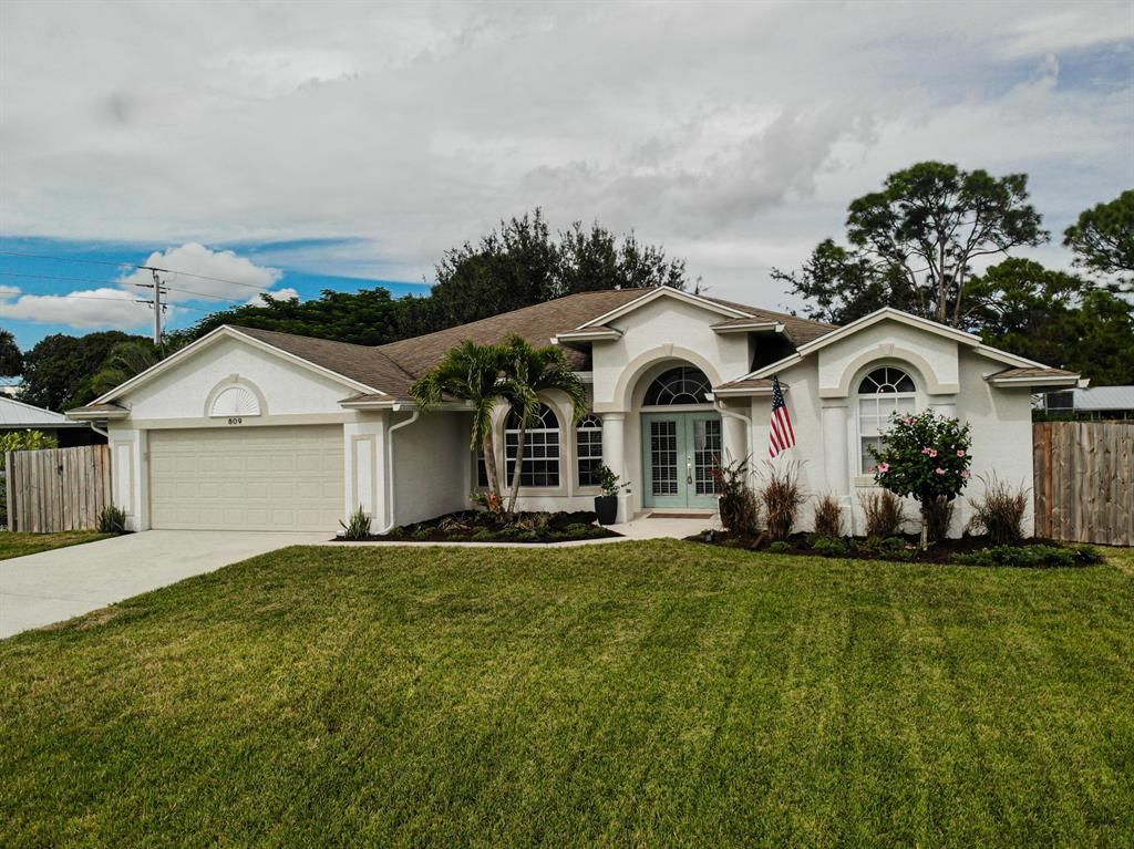Photo of 809 SE Lansdowne Avenue, Port Saint Lucie, FL 34983 (MLS # R10756471)