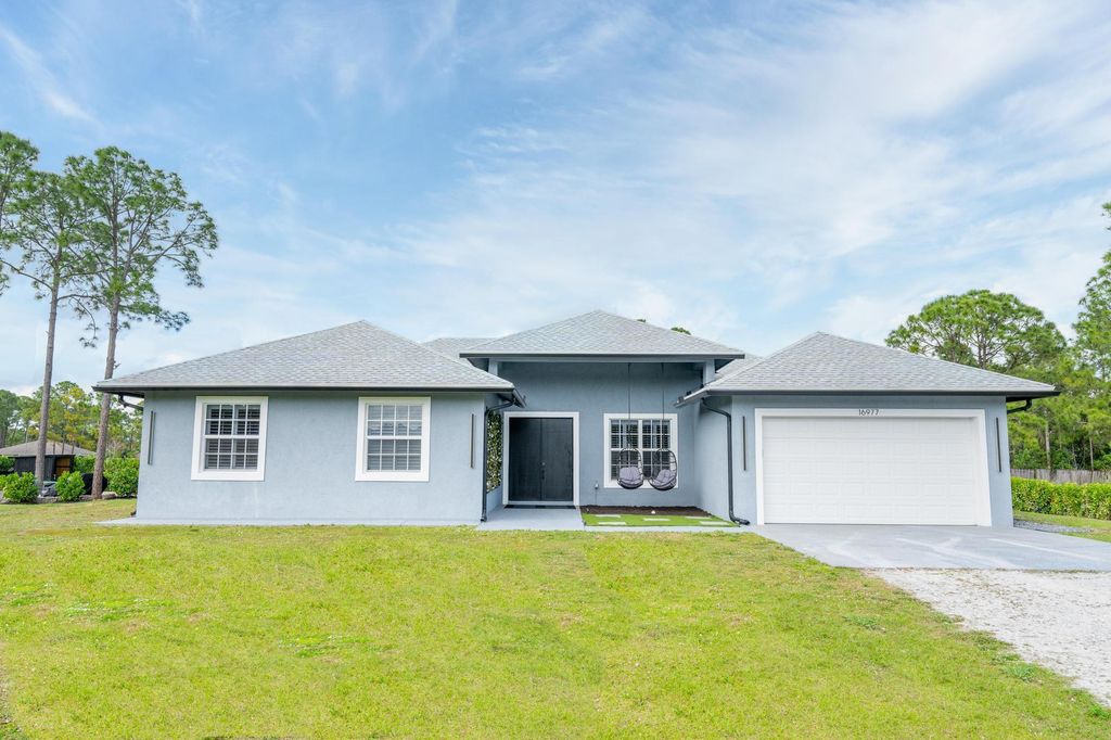 Photo of 16977 76th Street N, The Acreage, FL 33470 (MLS # R10966432)