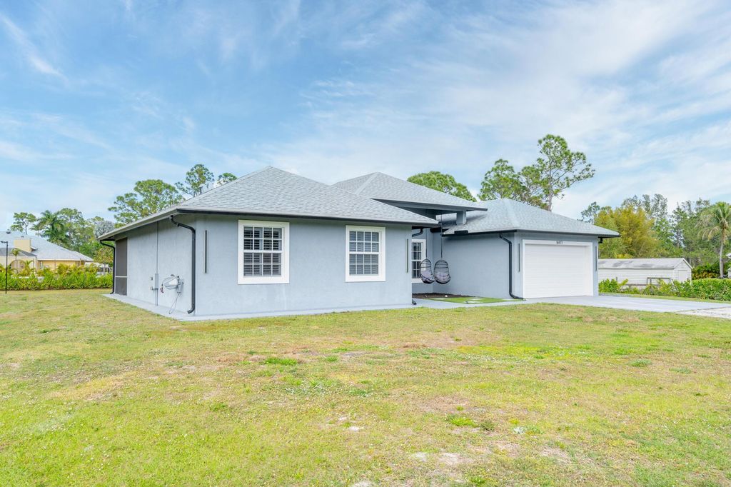 Photo of 16977 76th Street N, The Acreage, FL 33470 (MLS # R10966432)