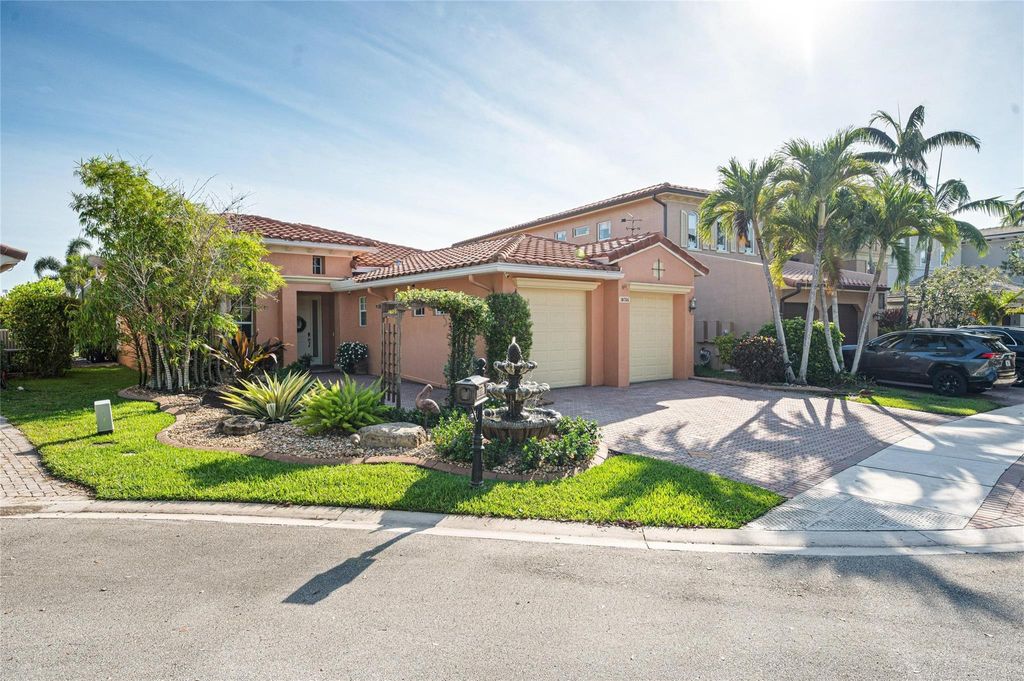 Photo of 10766 NW 80th Circle, Parkland, FL 33076 (MLS # F10503541)