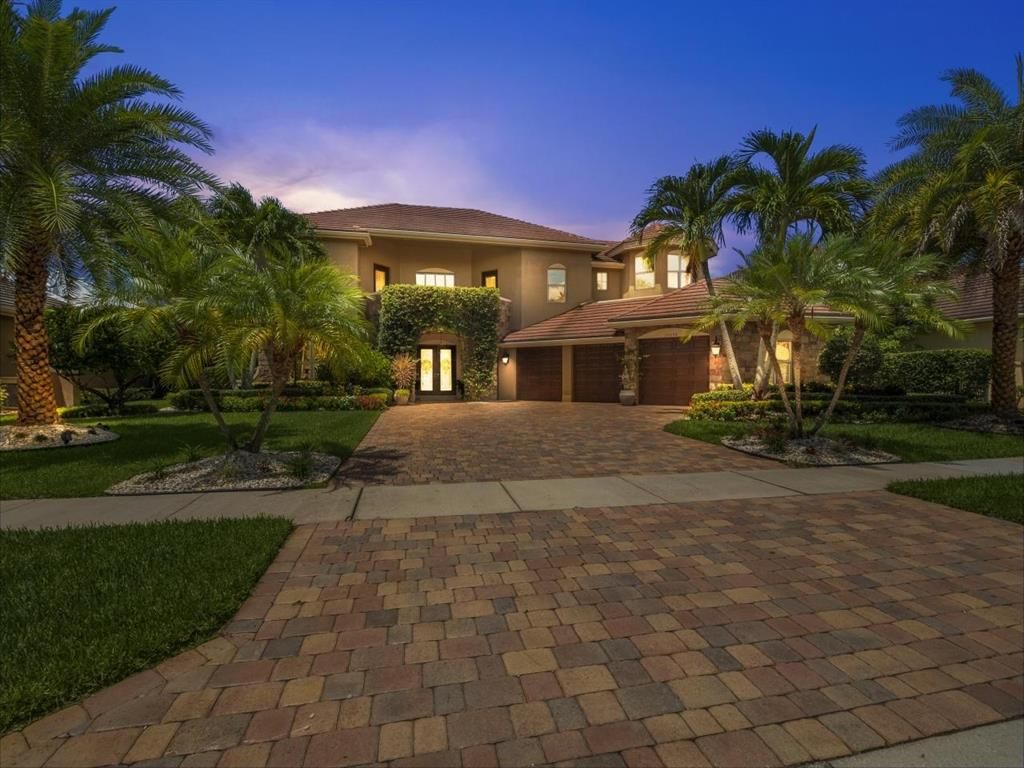 Photo of 10698 Versailles Boulevard, Wellington, FL 33449 (MLS # R10738512)