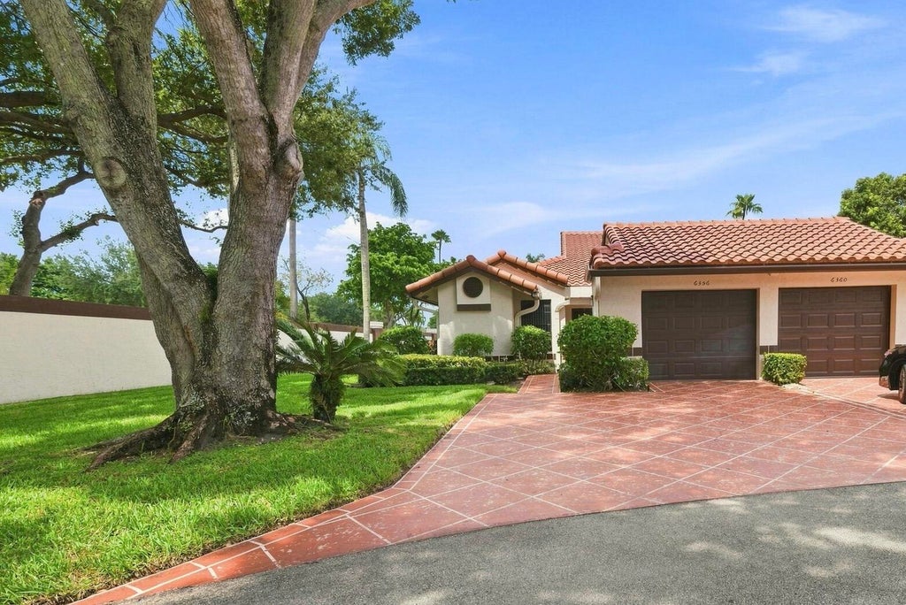 Photo of 6356 Kings Gate Circle, Delray Beach, FL 33484 (MLS # B26073839)