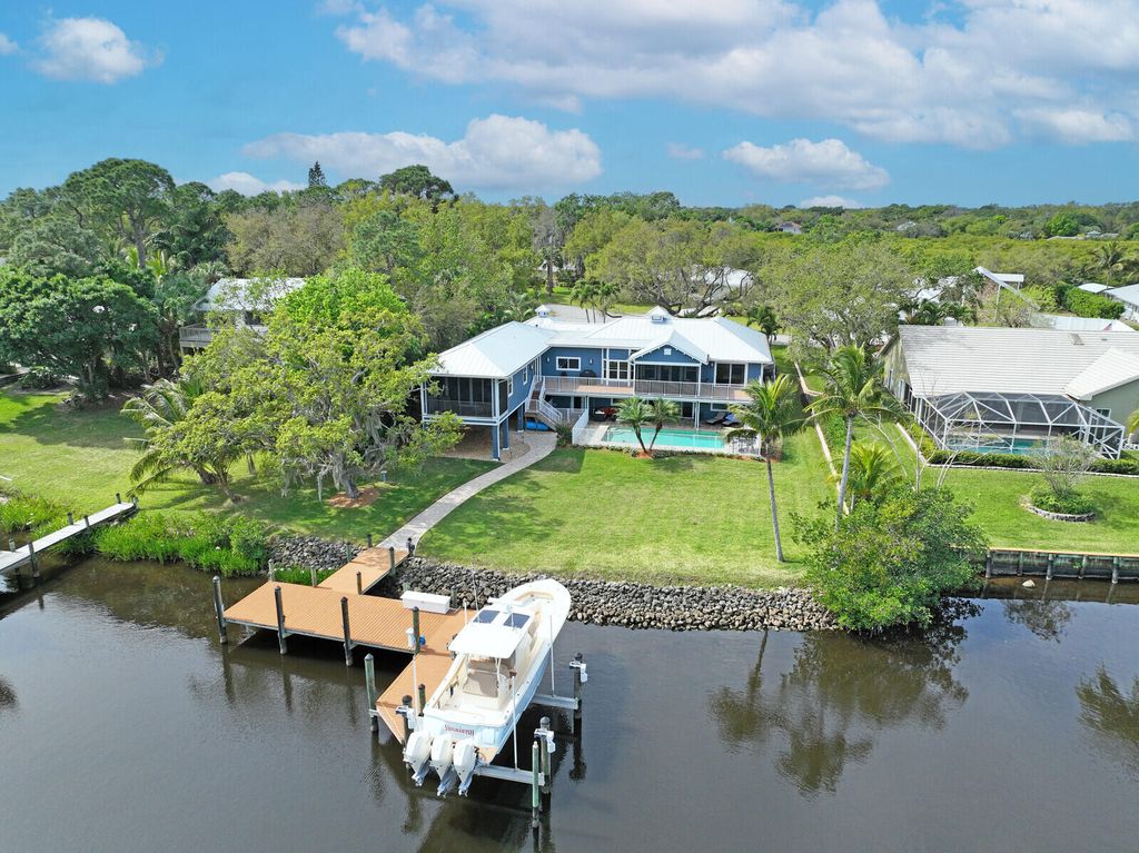 Photo of 821 SW Pine Tree Lane, Palm City, FL 34990 (MLS # R10964758)