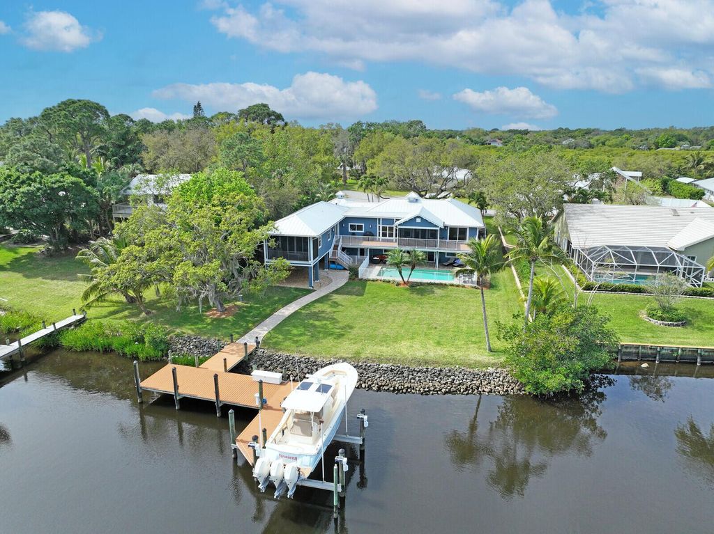 Photo of 821 SW Pine Tree Lane, Palm City, FL 34990 (MLS # R10964758)