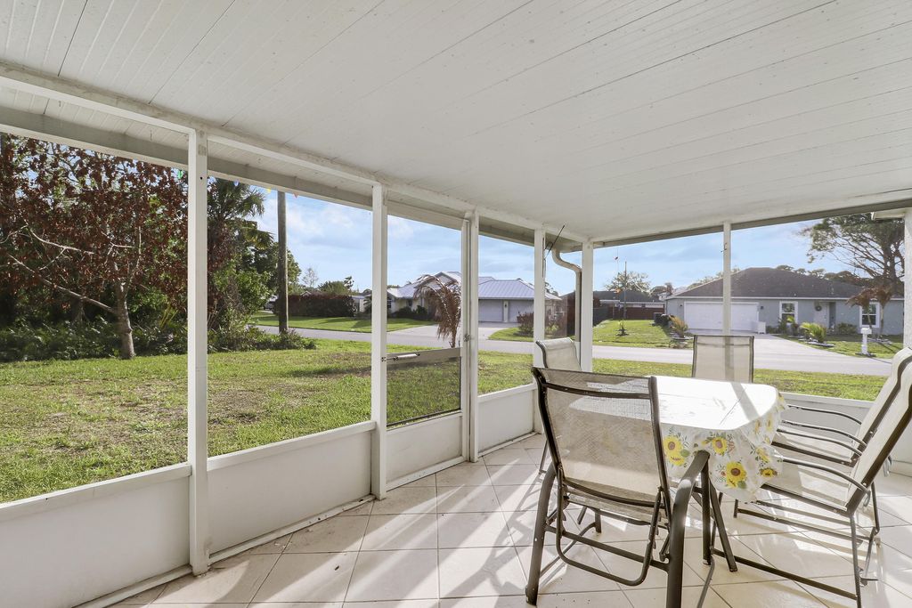 Photo of 702 SE Lighthouse Avenue SE, Port Saint Lucie, FL 34983 (MLS # B26005292)