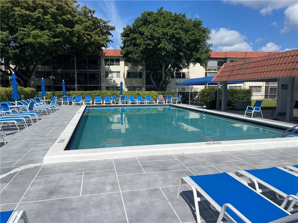 Photo of 9410 N Hollybrook Lake Drive #310, Pembroke Pines, FL 33025 (MLS # F10475950)