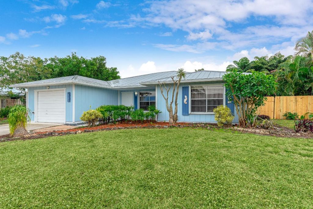 Photo of 928 NE Maranta Terrado, Jensen Beach, FL 34957 (MLS # R10968177)