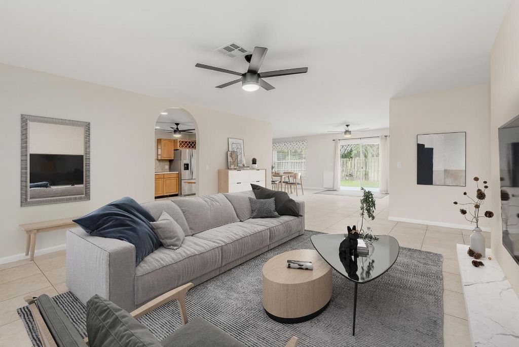 Photo of 928 NE Maranta Terrado, Jensen Beach, FL 34957 (MLS # R10968177)