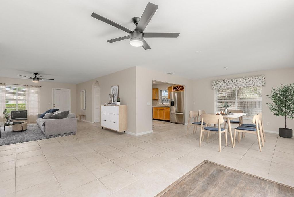 Photo of 928 NE Maranta Terrado, Jensen Beach, FL 34957 (MLS # R10968177)