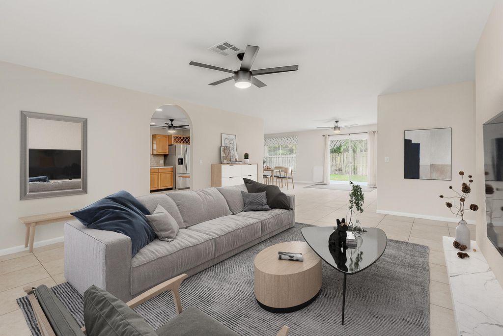 Photo of 928 NE Maranta Terrado, Jensen Beach, FL 34957 (MLS # R10968177)