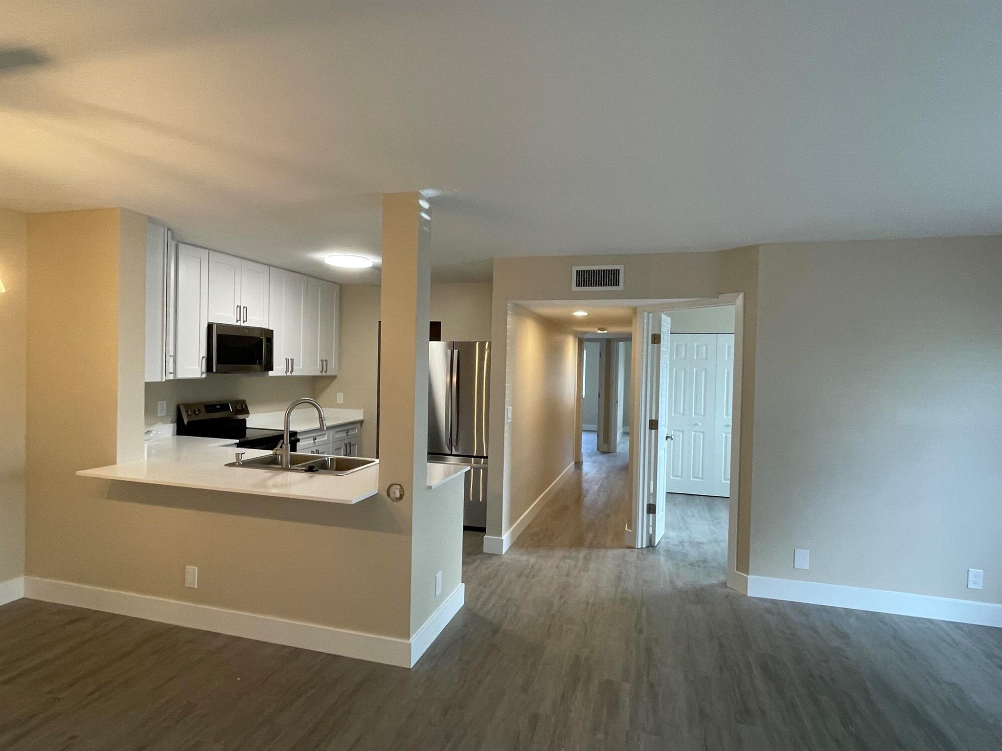 Everything BRAND NEW. Step into modern elegance with this fully renovated 3-bedroom apartment, where every detail has been carefully curated for comfort and style. This home has been completely transformed with all-new features, including:- State-of-the-art appliances for a sleek and functional kitchen- New full-size washer and dryer for ultimate convenience- New water heater and AC unit- Bathrooms w/ premium finishes- Designer flooring that adds warmth and sophistication- Contemporary light fixtures to brighten every space.Move-in ready and designed with today's lifestyle in mind, this is the perfect blend of luxury and everyday convenience.Avoid Paying a Cash Deposit - This simple and fast process could save you the hassle and upfront cost of a traditional cash deposit
