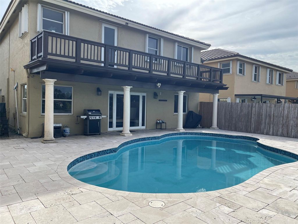 Photo of 414 SW 205th Ave, Pembroke Pines, FL 33029 (MLS # F10540849)