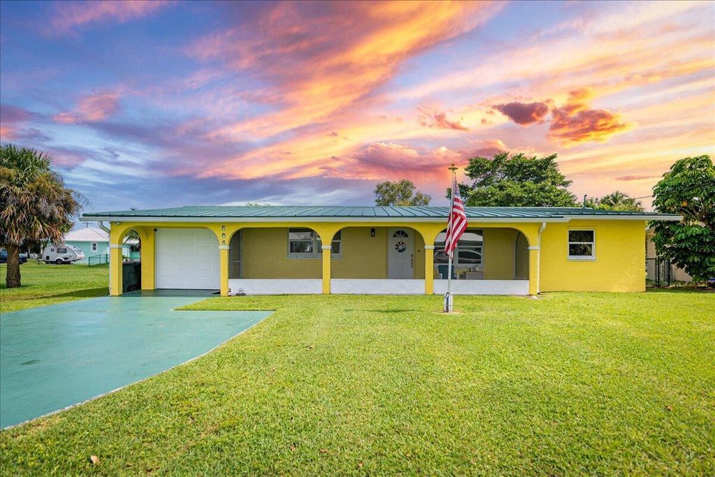 Photo of 606 Tradewinds Avenue, Fort Pierce, FL 34949 (MLS # R11026505)