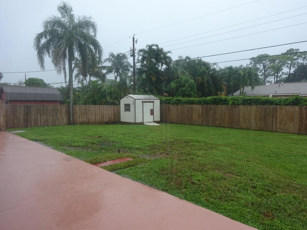 Photo of 4958 Dolphin Drive, Lake Worth, FL 33463 (MLS # R11122202)