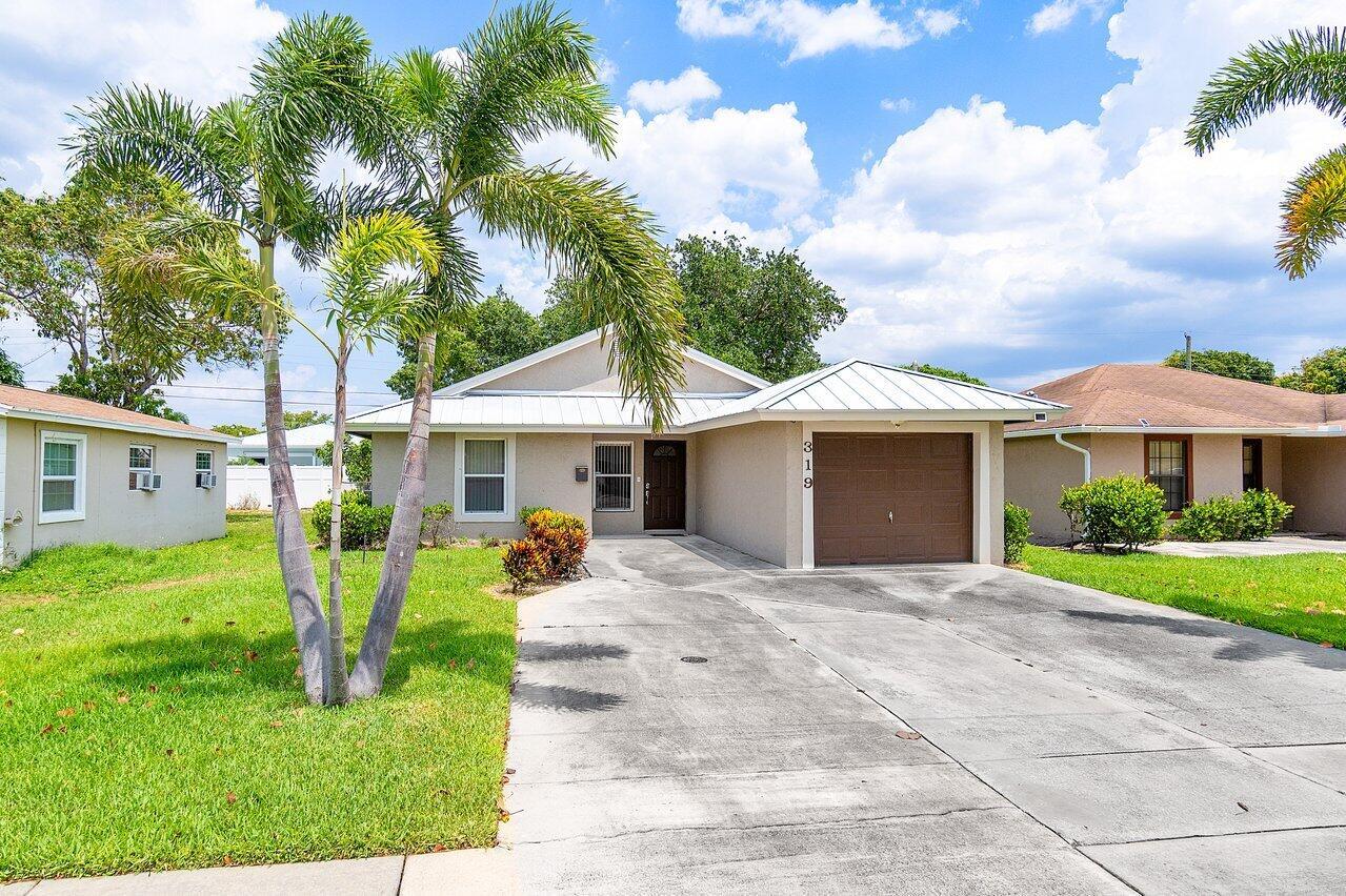 Turnkey Furnished 3 Bedroom 2 Bath Single Family Home located just minutes from Atlantic Avenue and the Beaches. Oversized Driveway with 1 car garage! Screened patio and private fenced in backyard. Lawn Care included in Rent!