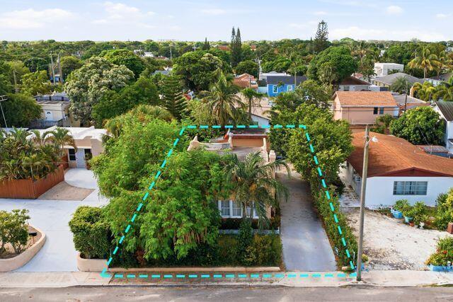 Photo of 810 MCINTOSH Street, West Palm Beach, FL 33405 (MLS # B26087523)