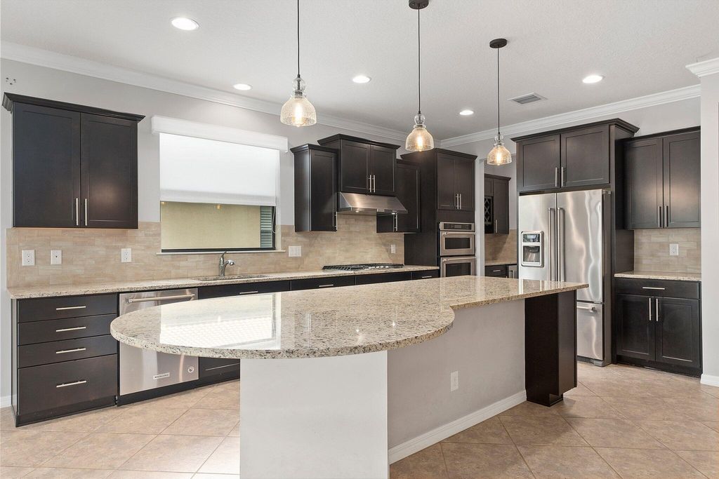 Photo of 223 SE Courances Drive, Port Saint Lucie, FL 34984 (MLS # R10920180)