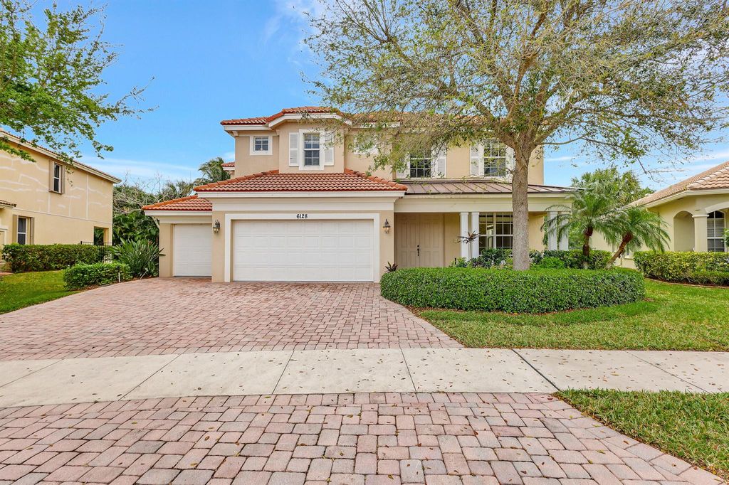 Photo of 6128 SE Crooked Oak Avenue, Hobe Sound, FL 33455 (MLS # R10965866)