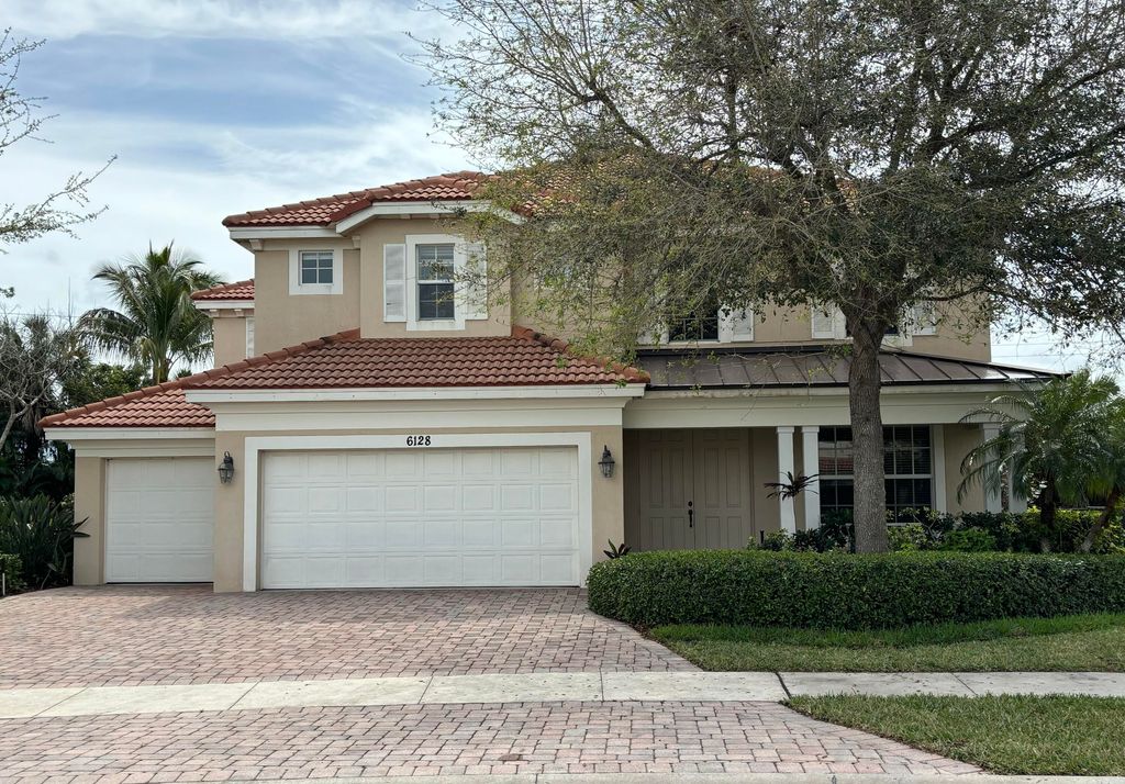 Photo of 6128 SE Crooked Oak Avenue, Hobe Sound, FL 33455 (MLS # R10965866)