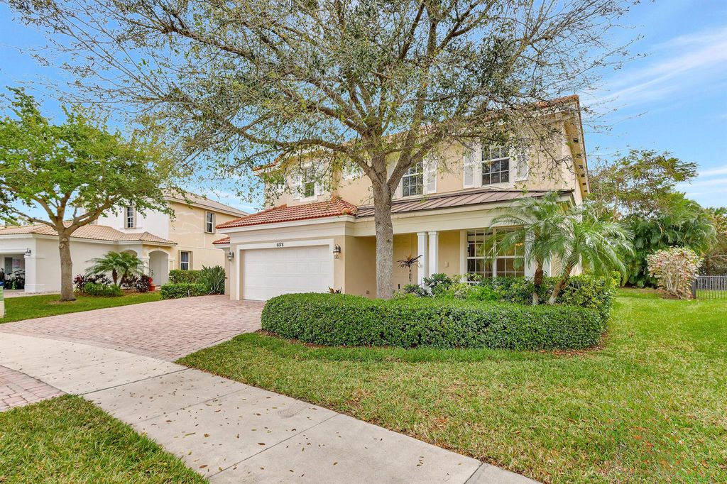 Photo of 6128 SE Crooked Oak Avenue, Hobe Sound, FL 33455 (MLS # R10965866)