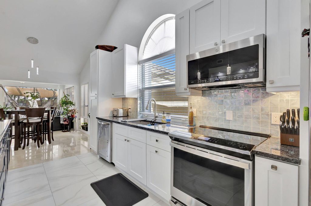 Photo of 2354 Saratoga Bay Drive, West Palm Beach, FL 33409 (MLS # R11159558)