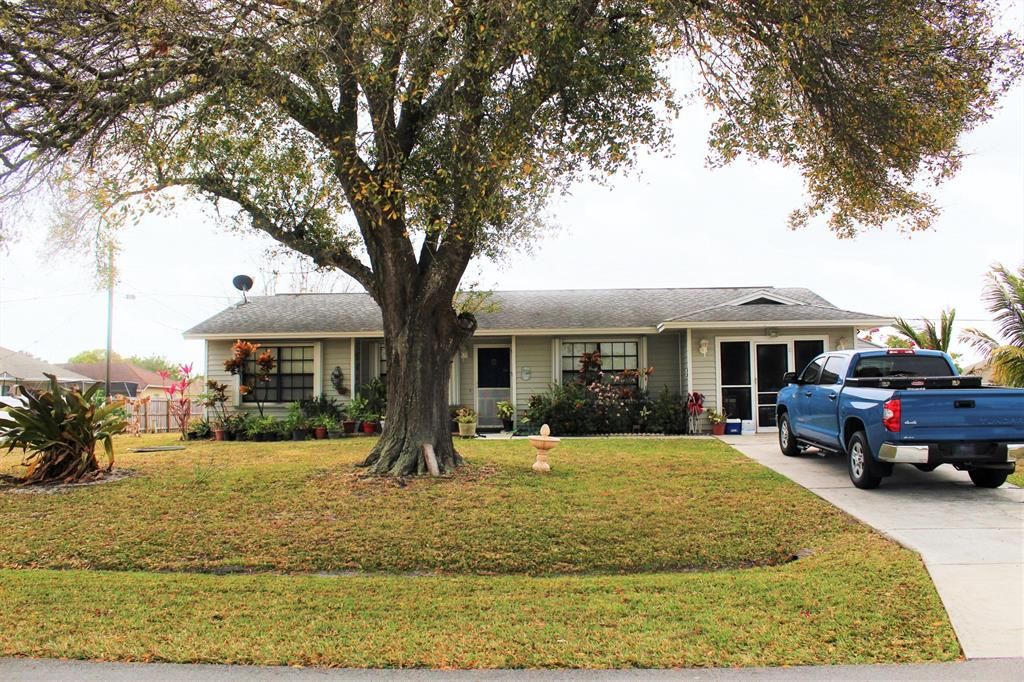 Photo of 590 SW Gulfspray Terrace, Port Saint Lucie, FL 34953 (MLS # R10690088)