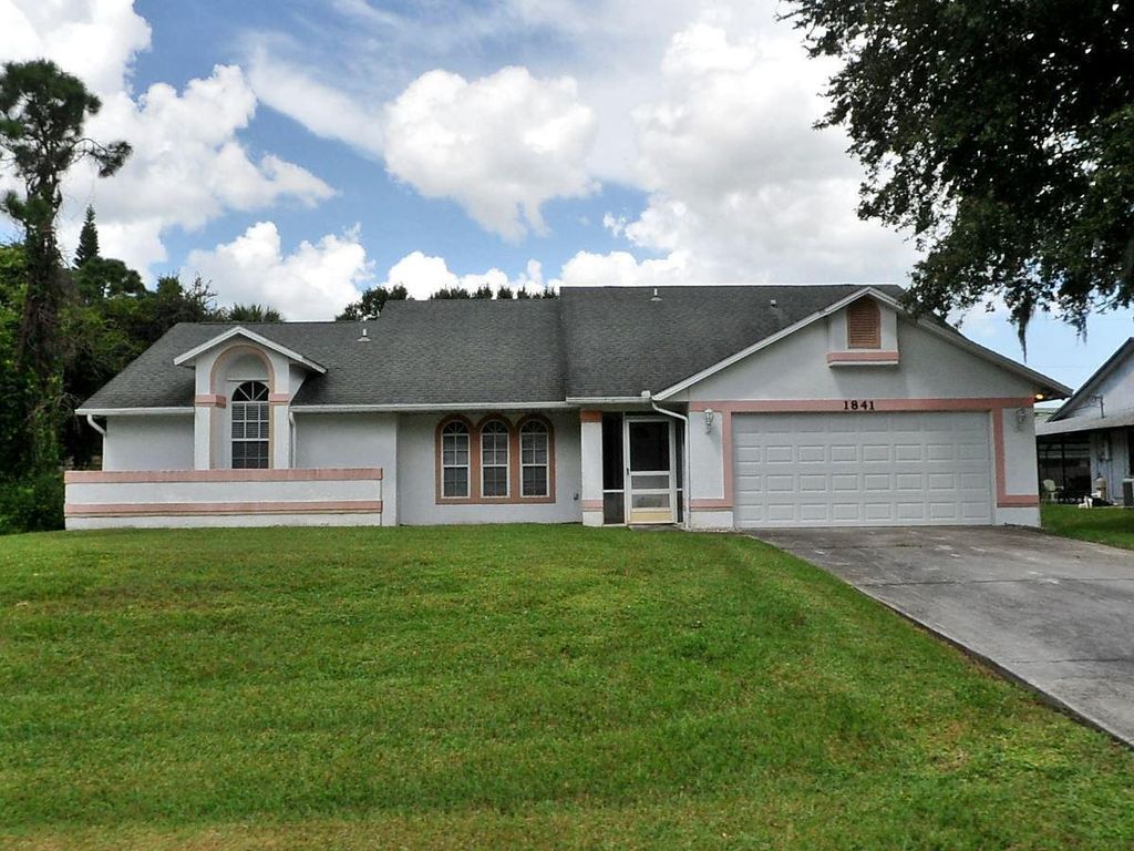 Photo of 1841 SW Michelangelo Avenue, Port St Lucie, FL 34953 (MLS # R10899401)