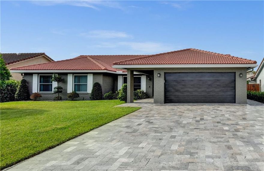 GORGEOUSLY UPDATED 4 BED/2 BATH POOL HOME! SO MANY UPGRADES! NEWER ROOF FROM 2017, HURRICANE IMPACT WINDOWS & BEAUTIFUL IMPACT GLASS FRONT DOOR, NEW MODERN IMPACT GARAGE DOOR, NEW TRAVERTINE PAVED EXTENDED DRIVEWAY, NEWER AC (3 YRS NEW), BEAUTIFUL POOL WITH RECENT DIAMOND BRIGHT, NEW SCREENS ON SCREEN ENCLOSURE, UPDATED POOL PATIO DECKING, NEW POOL HEATER & POOL PUMP, CROWN MOLDING, UPDATED KITCHEN WITH NEW STAINLESS STEEL APPLIANCES, WOOD CABINETS, GRANITE COUNTERTOP, NEWER HUGE FRONT LOADER WASHER & DRYER, UPDATED BATHROOMS, FULLY FENCED BACKYARD, NEW SPRINKLER SYSTEM & PUMP (on well so no sprinkler water bill!), SHED INCLUDED, LOW HOA, COMMUNITY POOL & SMALL DOG PARK, GREAT SCHOOLS! TOP LOCATION-WALKING DISTANCE TO SHOPPES, HOSPITAL, SCHOOLS & MORE! MARJORY STONEMAN DOUGLAS ZONED.