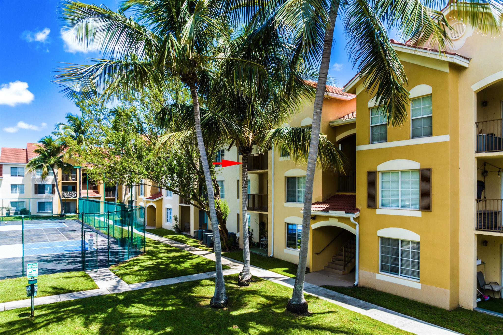 Enjoy resort-style living in this spacious 2-bedroom, 2-bathroom apartment on the third floor with peaceful pickleball court views. This well-maintained home features a walk in closet in the primary bedroom, brand-new A/C and impact windows providing comfort and reliability. Located in a gated community, residents can take advantage of amenities including a swimming pool, Indoor Basketball, pickleball, Full gym, clubhouse, and more. Perfectly situated near shopping, dining, and major highways, this home combines convenience with lifestyle. Water, Cable and internet are included!!