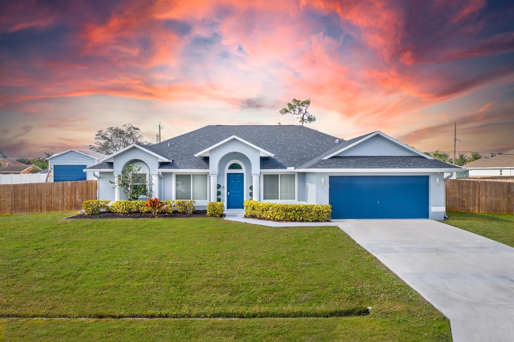 Photo of 1372 SE Proctor Lane, Port St Lucie, FL 34983 (MLS # R10862409)