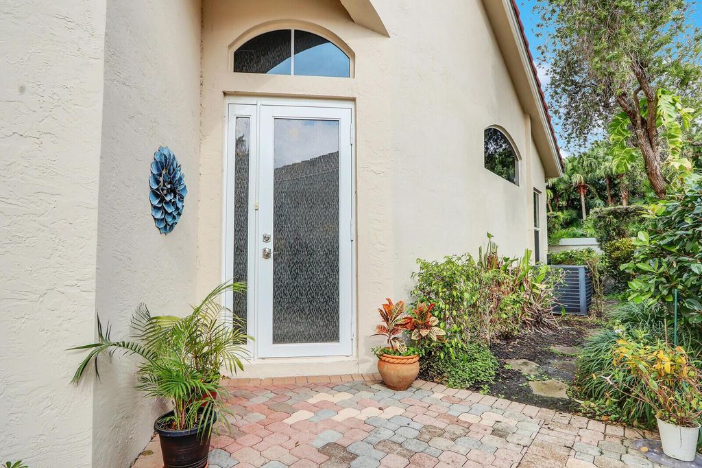 Photo of 8180 Sandpiper Way, West Palm Beach, FL 33412 (MLS # R10958515)