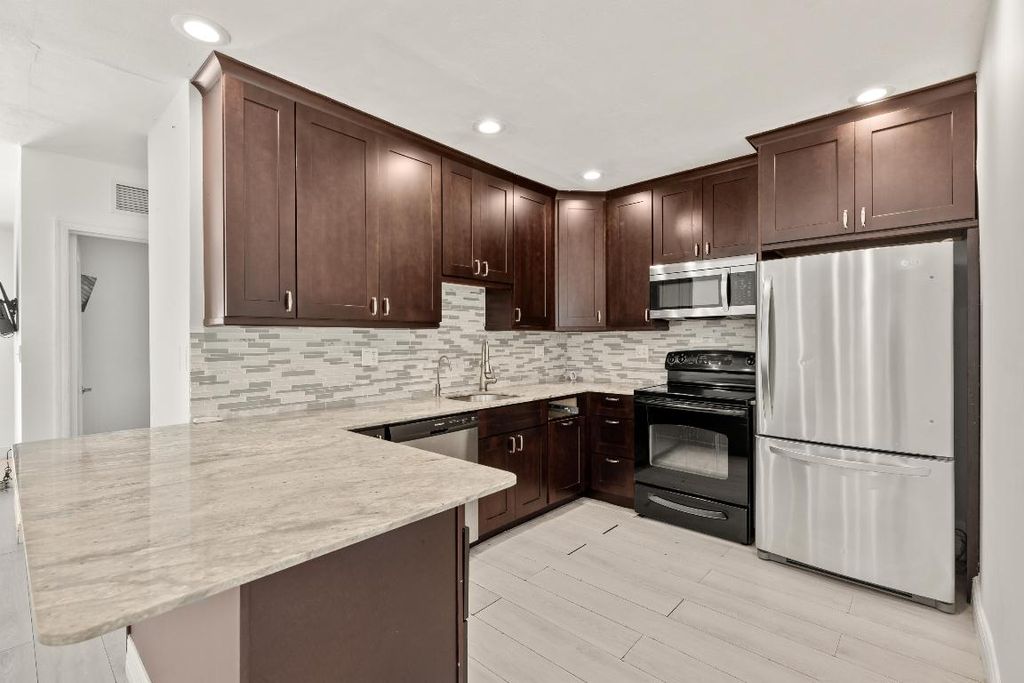 Photo of 1637 N Victoria Park Road, Fort Lauderdale, FL 33305 (MLS # R11112791)