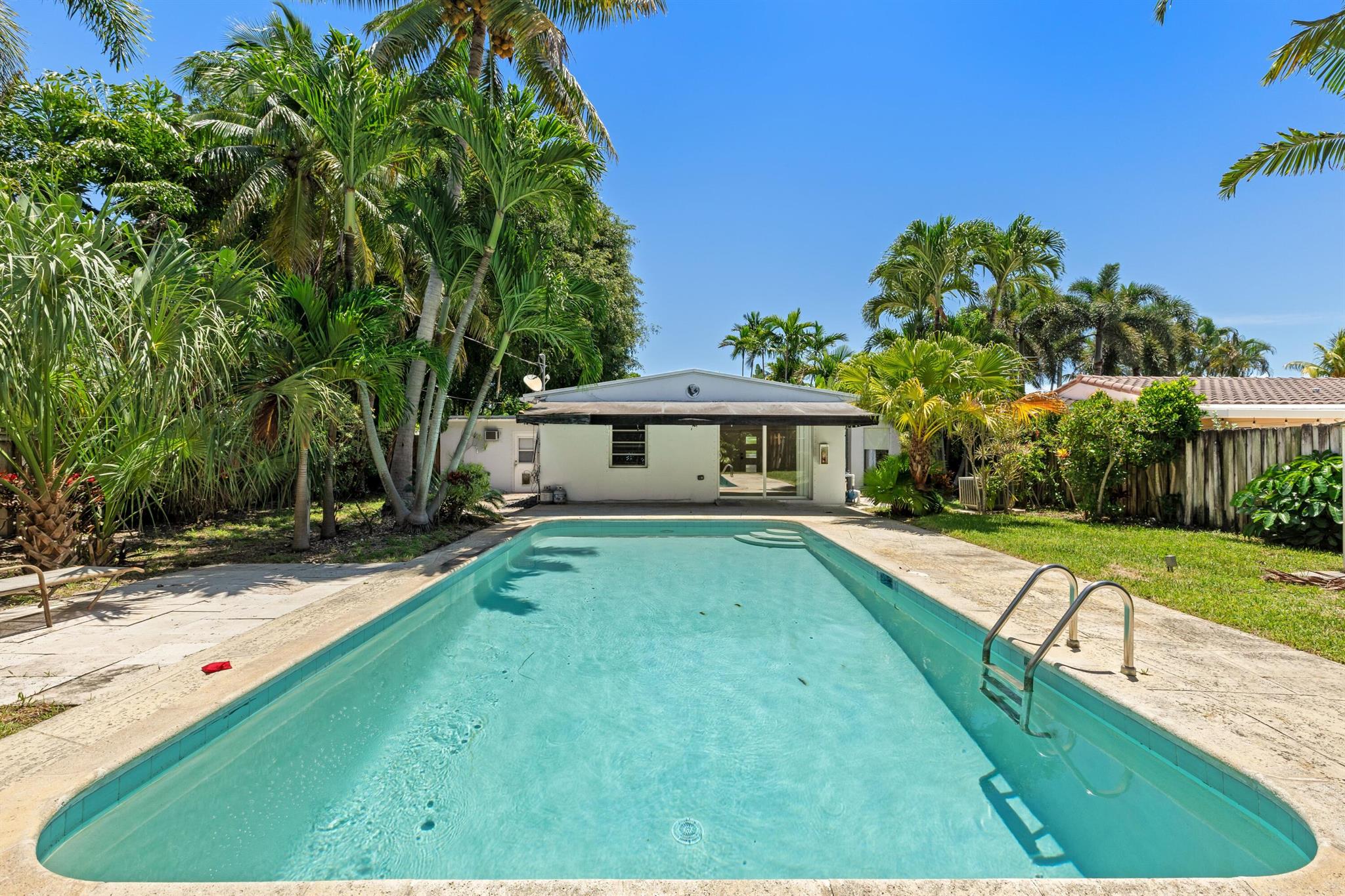 Beautifully updated 3BR/3BA home in the heart of Poinsettia Heights. Features include an open floor plan, vinyl flooring, stainless steel appliances, and a fully furnished option. The bright living area overlooks a spacious backyard with a large pool and patio--perfect for entertaining with newer Pool Equipment. The third bedroom and bath have a private entrance, ideal for a guest suite, office, or Airbnb. Enjoy a tranquil setting just minutes from US1, top gyms, shopping, dining, and the beach. Endless possibilities in one of East Fort Lauderdale's most desirable neighborhoods.